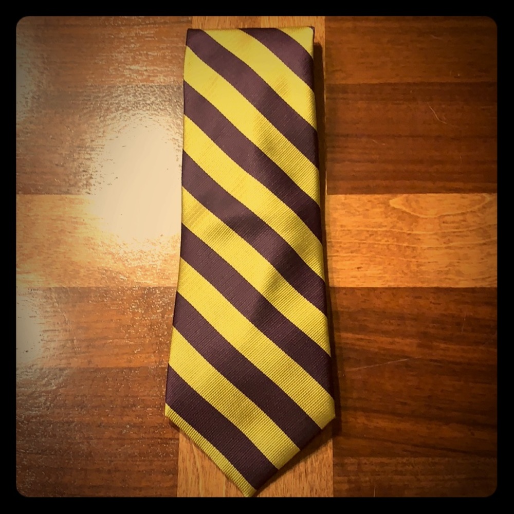 Purple and gold wolfmark tie